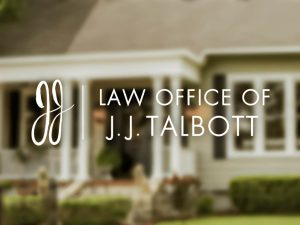 Logo for the Law Office of J.J. Talbott displayed in front of a blurred residential-style building.